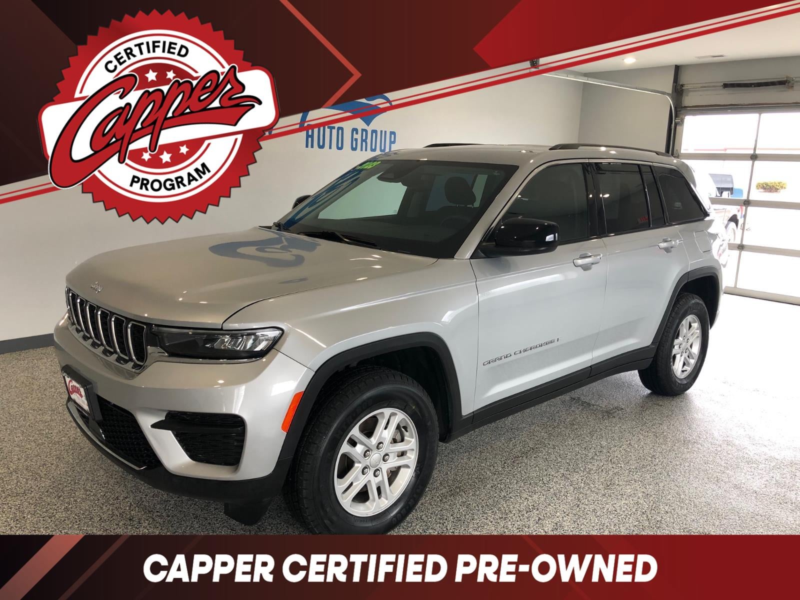 2023 Jeep Grand Cherokee Laredo in Silver Zyn — front three-quarter view