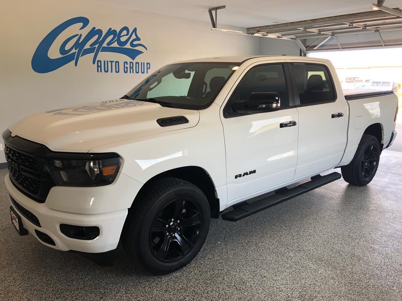 2023 RAM 1500 Big Horn in Bright Whi — front three-quarter view