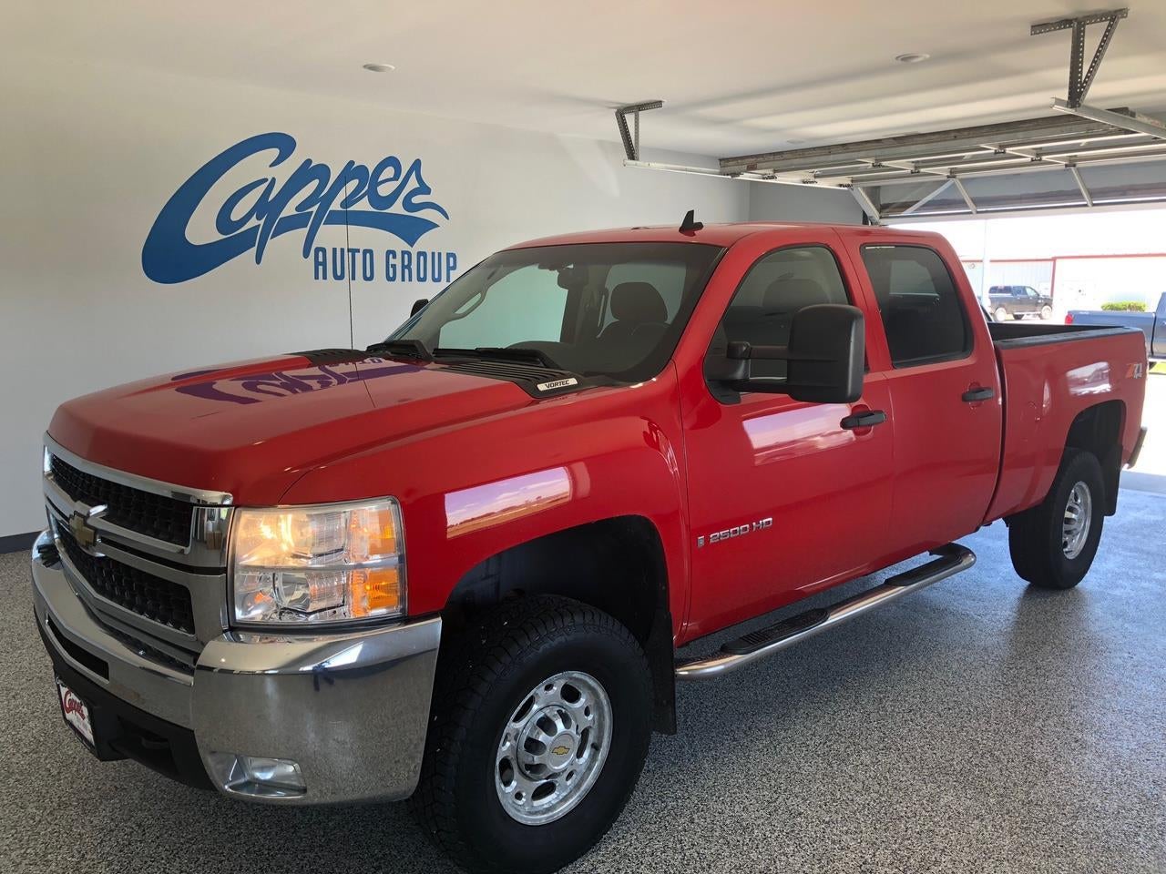2007 Chevrolet Silverado 2500 HD LT w/1LT in Victory Red — front three-quarter view