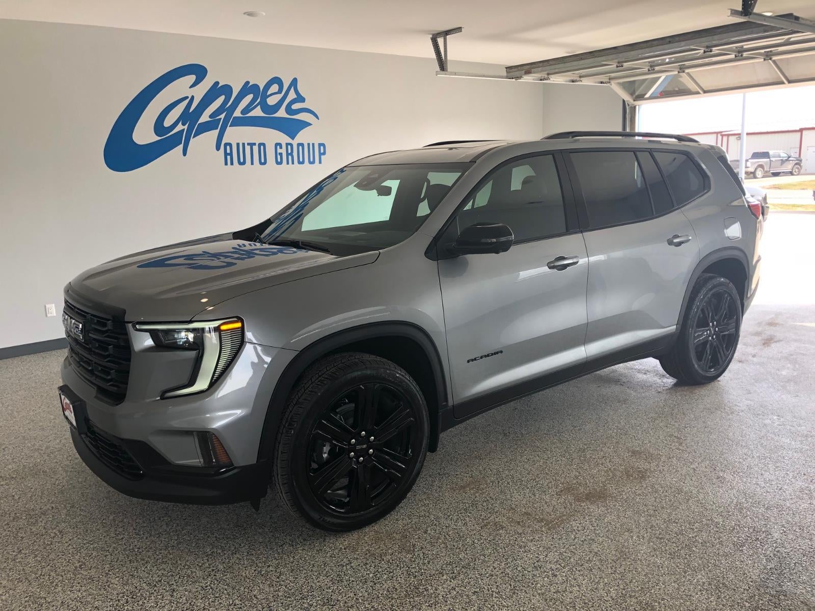 2026 GMC Acadia Elevation in Sterling Metallic — front three-quarter view