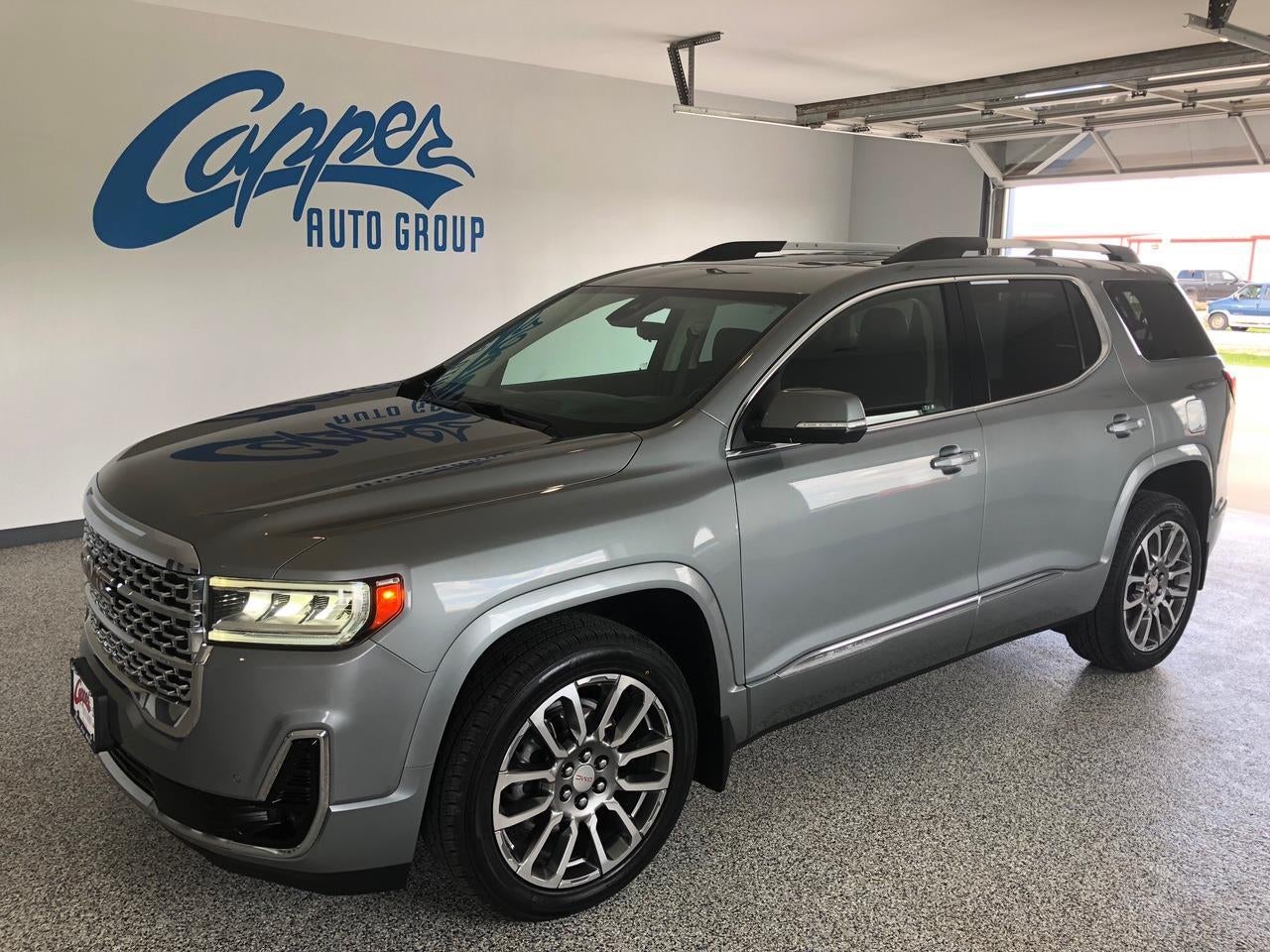 2023 GMC Acadia Denali in Sterling Metallic — front three-quarter view