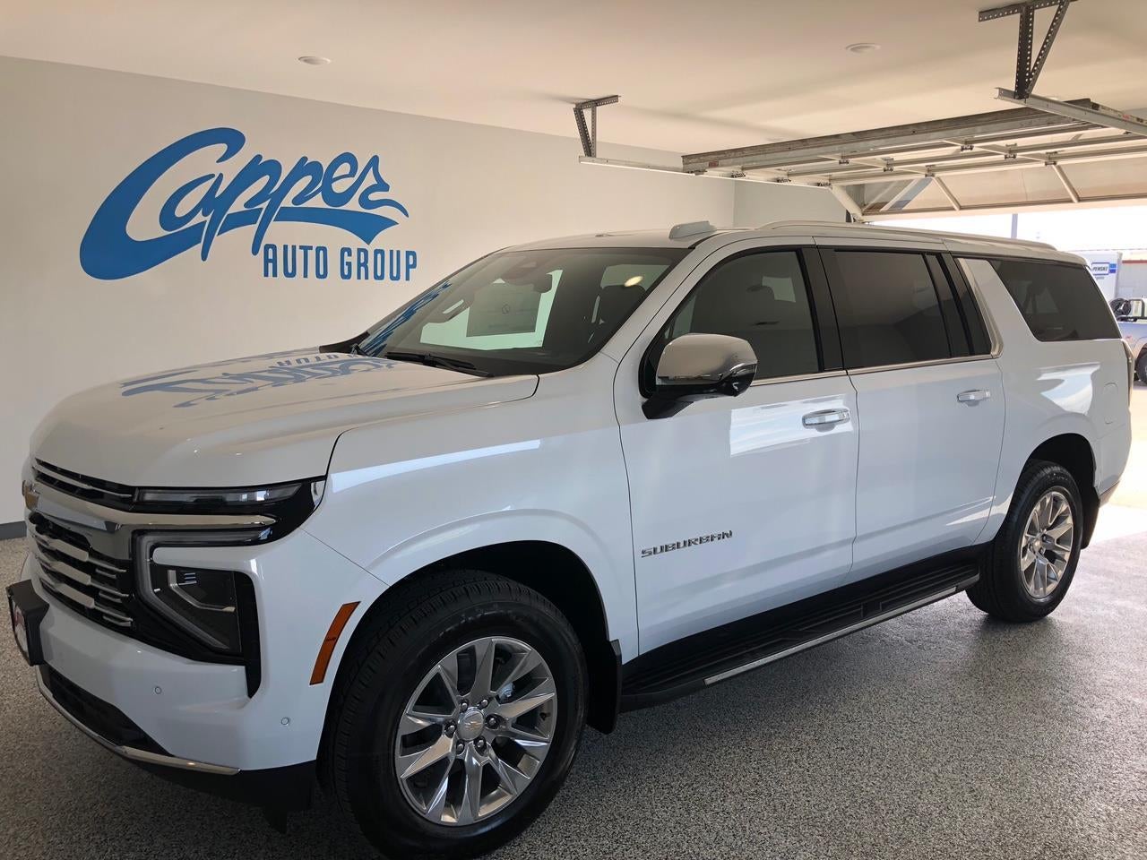 2026 Chevrolet Suburban Premier in Polar White Tricoat — front three-quarter view