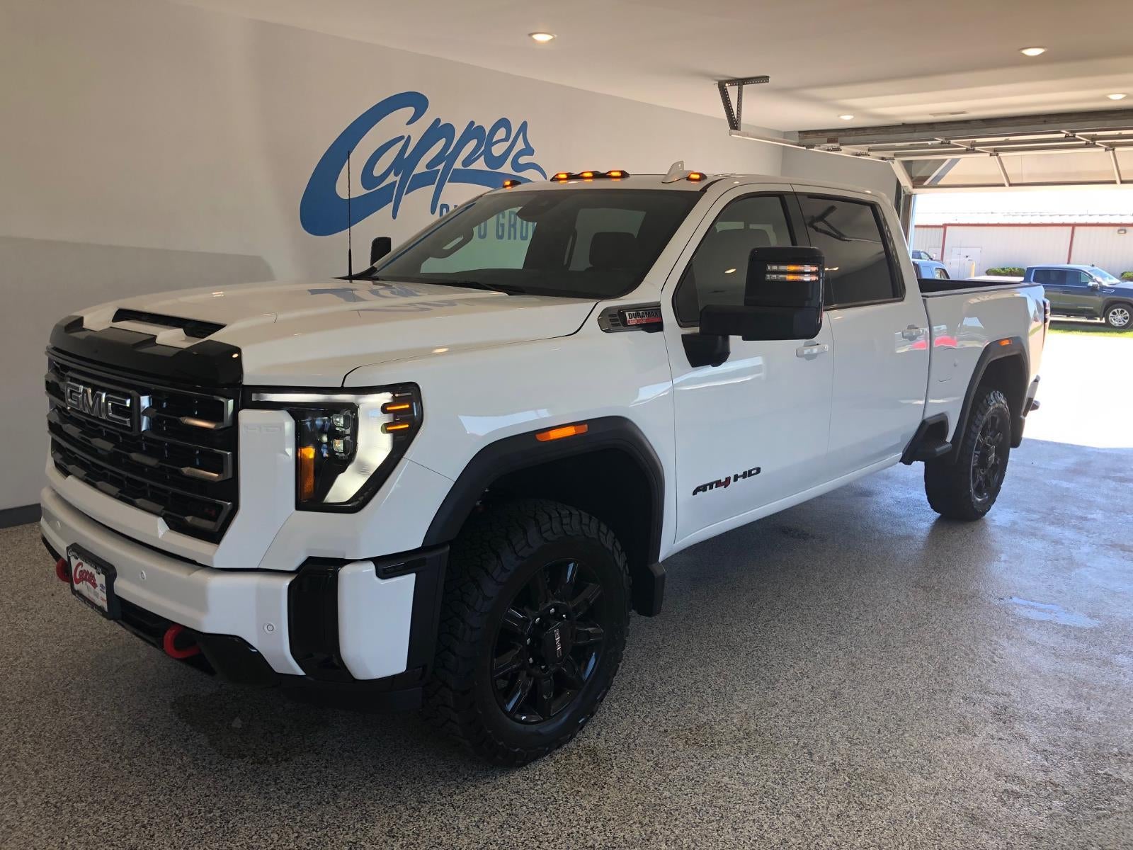 2026 GMC Sierra 2500 HD AT4 in Summit White — front three-quarter view