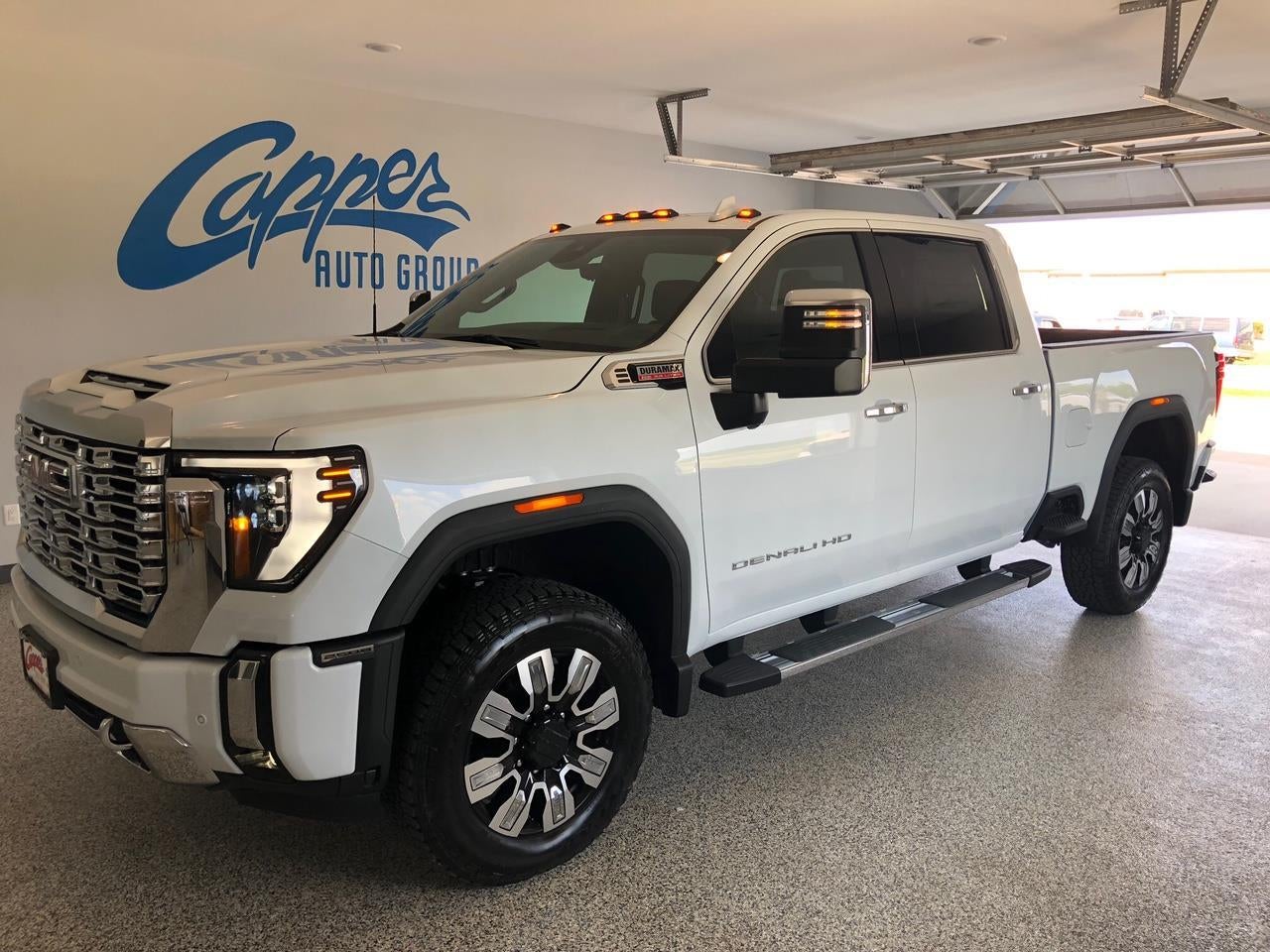 2026 GMC Sierra 2500 HD Denali in Glacier White Tricoat — front three-quarter view