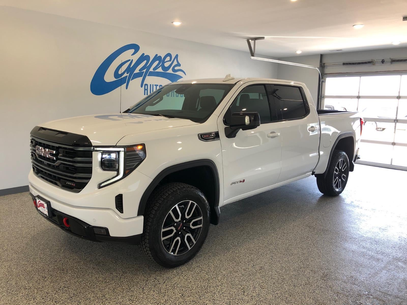 2026 GMC Sierra 1500 AT4 in Summit White — front three-quarter view